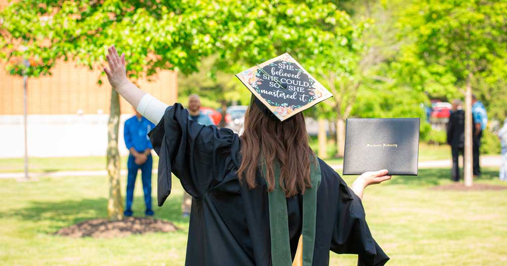 A student celebrates post graduation
