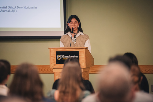 Honors student Ruby Rusk presenting